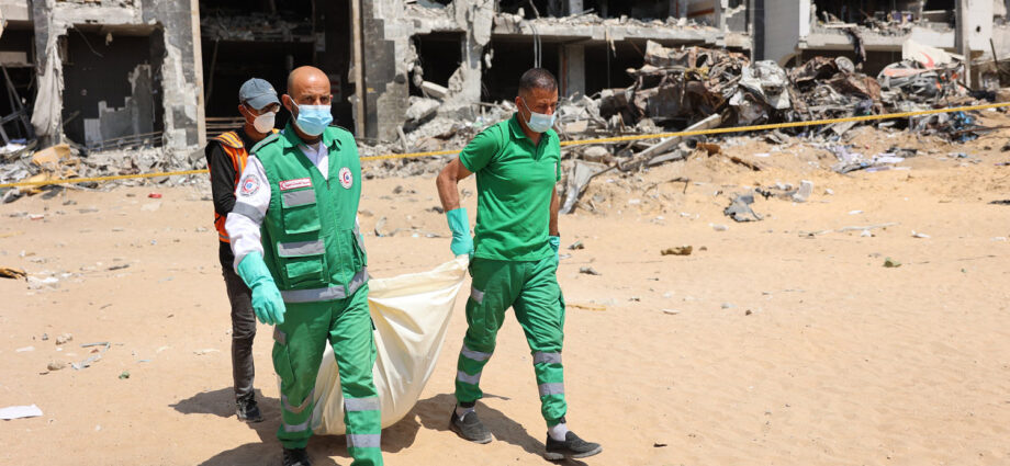in-the-wake-of-idf-retreat,-gazans-sift-through-the-rubble-for-the-bodies-of-their-dead