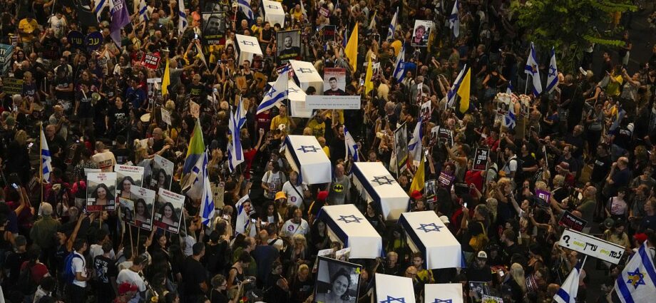 protesters-march-in-tel-aviv-with-makeshift-coffins-to-demand-release-of-gaza-hostages