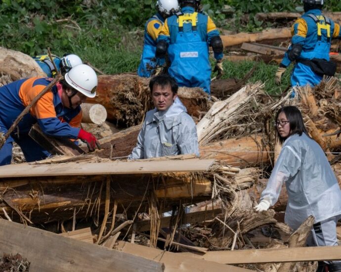 rescuers-comb-muddy-riverbanks-after-floods-kill-six-in-japan