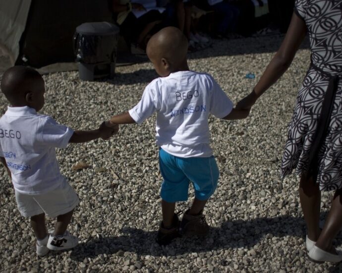 Adoption is challenging. But these parents try to evacuate Haitian kids from a war zone.