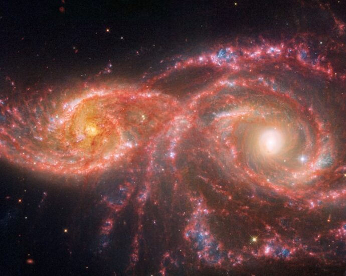 Stare into the ‘blood-soaked eyes’ of 2 spooky galaxies in new Hubble, JWST images (video)