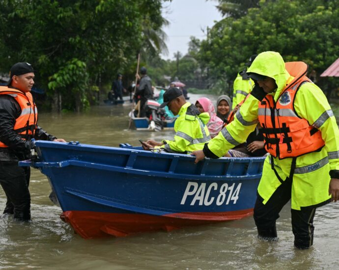 malaysia,-thailand-brace-for-more-rains-after-floods-kill-more-than-30