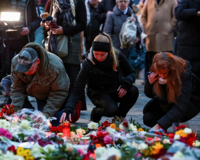 germans-mourn-five-people-killed,-200-injured-in-christmas-market-attack