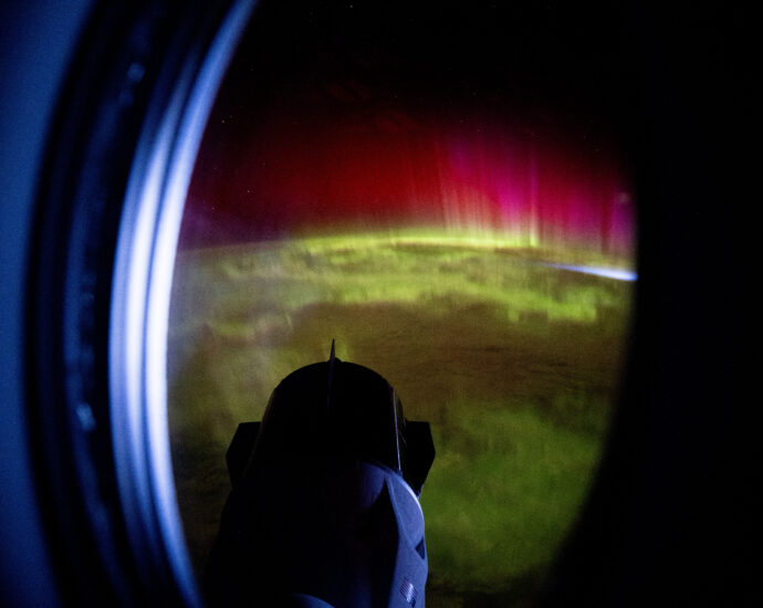 Red and Green Aurora Move Through Earth’s Atmosphere