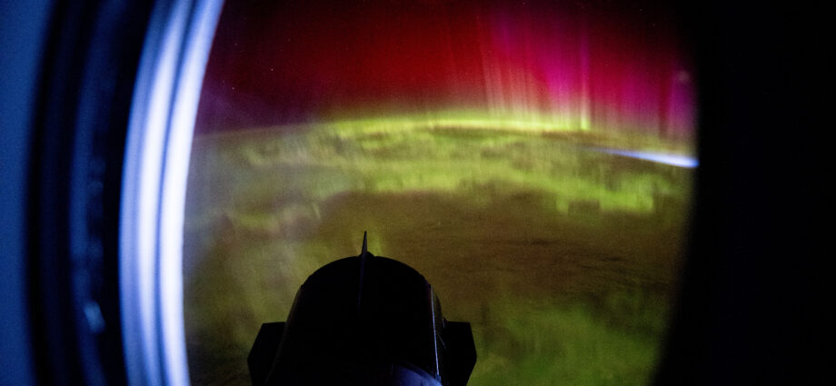 Red and Green Aurora Move Through Earth’s Atmosphere