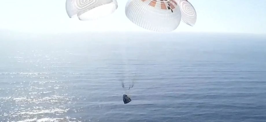 Four space tourists return to Earth after a private flight over the poles