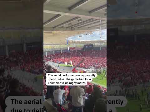 parachutist-rescued-after-dangling-from-rugby-stadium-roof-in-france-|-reuters