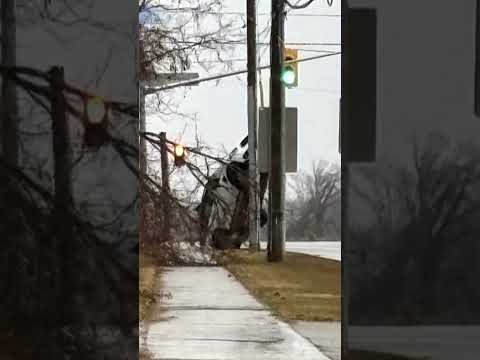 car-left-dangling-from-tangled-wires-in-barrie