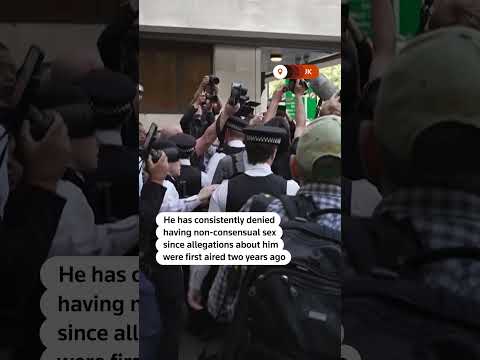russell-brand-arrives-at-uk-court