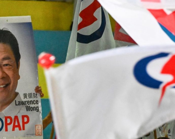governing-party-set-for-solid-win-in-singapore-vote,-opposition-holds-firm