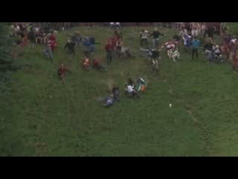 cheese-lovers-hurl-themselves-down-a-hill-in-gloucestershire-in-famous-race