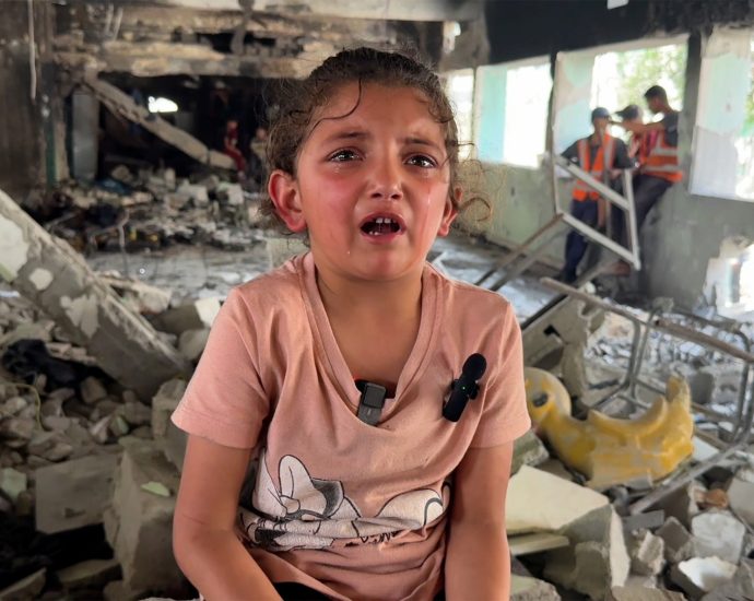 silhouetted-by-fire,-6-year-old-girl-survives-israeli-attack-in-gaza