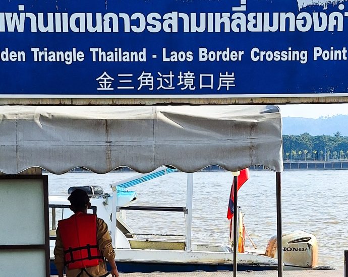 ‘each-person-had-10-phones’:-trapped-in-a-cyber-scam-centre-in-laos
