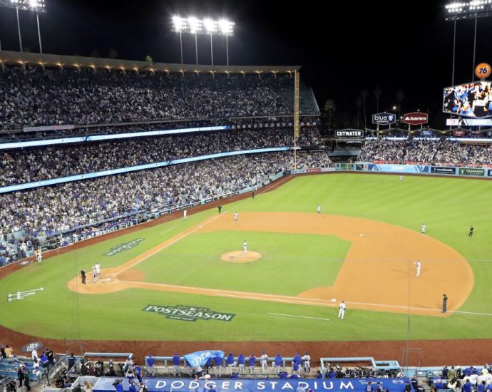 Dodgers place netting after falling concrete hits fan