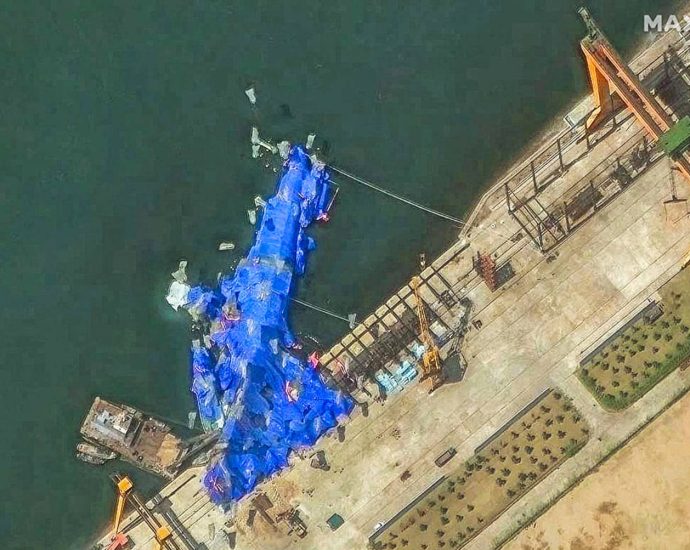 north-korea-pulls-capsized-warship-upright-after-botched-launch,-report-says