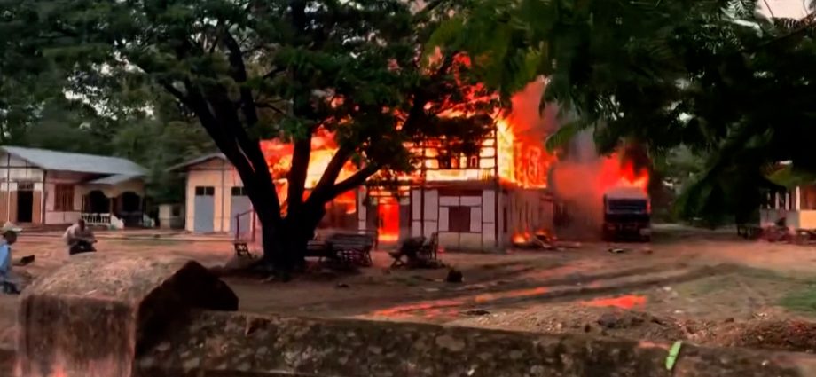 military-jet-crashes-in-myanmar,-homes-set-ablaze