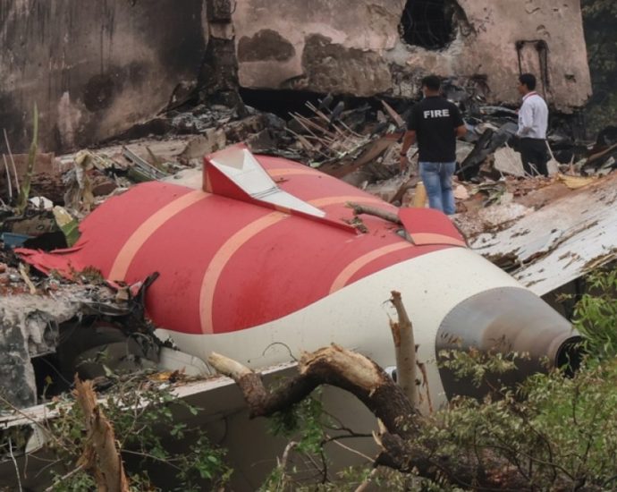 investigators-search-air-india-crash-site-as-modi-meets-lone-survivor