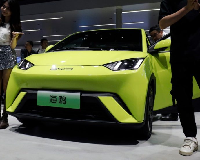 A new car for $7,700: In China, fears grow of an EV financial crisis amid pricing war