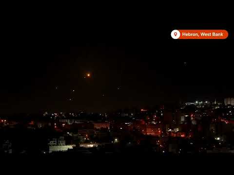 iran-missiles-streak-through-israel,-west-bank-as-attacks-continue-|-reuters