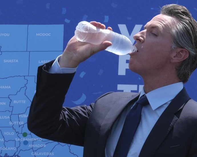 newsom’s-podcast-sidekick:-a-single-use-plastic-water-bottle