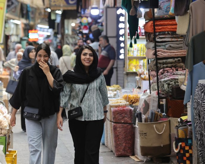 ‘feels-like-heaven’:-iranians-return-to-tehran,-uncertain-of-future