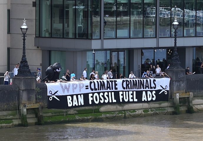climate-activists protest at-london-headquarters-of-global-ad-giant-wpp