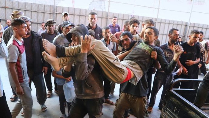 israeli-troops-open-fire-on-palestinians-en-route-to-food-distribution-site,-killing-32
