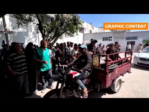 warning:-graphic-content:-israeli-fire-kills-dozens-seeking-aid-in-gaza-as-hunger-worsens-|-reuters