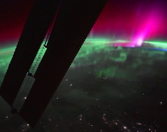 astronaut-captures-elusive-flamingo-pink-aurora-in-awe-inspiring-footage