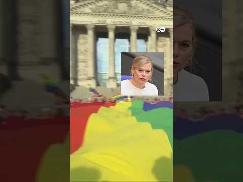 huge-rainbow-flag-placed-at-reichstag-by-protesters-ahead-of-berlin-pride-|-dw-news