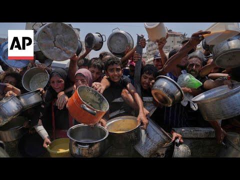 desperate-palestinians-jostle-for-food-at-charity-kitchen-in-gaza