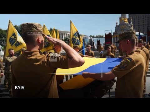 mourners-gather-for-funeral-of-fallen-soldier-in-kyiv,-react-to-upcoming-ukraine-talks