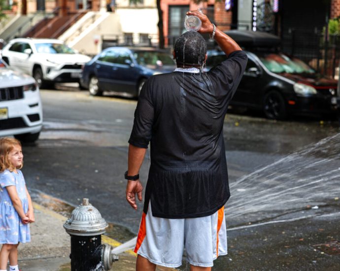 broiled-by-heat-waves,-residents-of-the-concrete-jungle-suffer