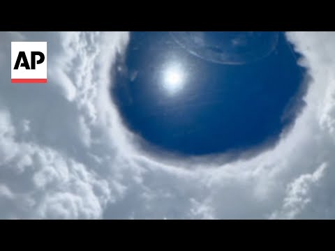 watch:-eye-of-hurricane-erin-as-seen-by-planes-flying-through-the-storm