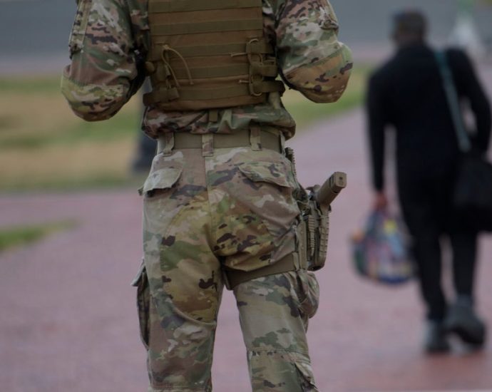 pentagon-says-some-guard-units-in-washington-are-now-carrying-firearms-as-the-traitor-targets-more-cities