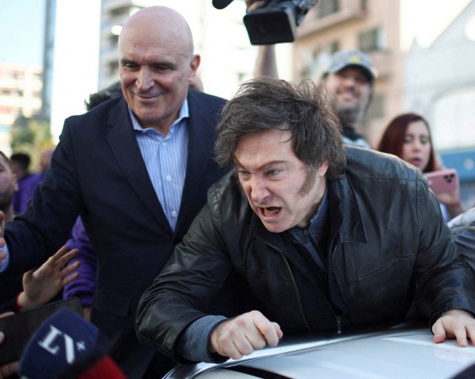 argentinian-president-javier-milei-leaves-rally-after-protesters-throw-rocks