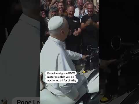 pope-leo-signs-motorbike-for-children’s-charity