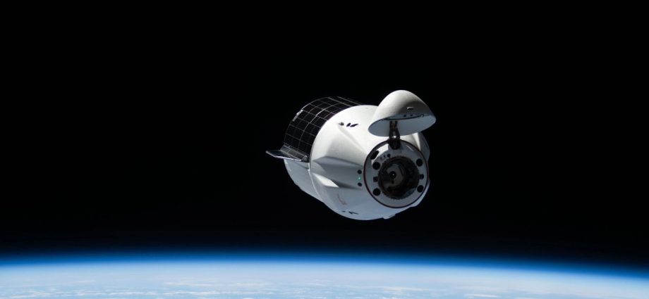 SpaceX Dragon cargo capsule boosts ISS higher above Earth in key test