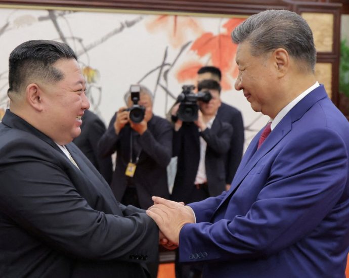kim,-xi-hail-bond-as-north-korea-says-it-will-protect-china’s-interests