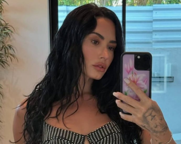 demi-lovato-drops-hints-of-new-club-banger-while-dancing-in-glitter-and-fishnets