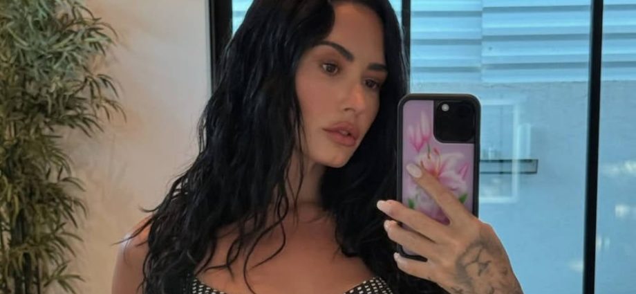 demi-lovato-drops-hints-of-new-club-banger-while-dancing-in-glitter-and-fishnets