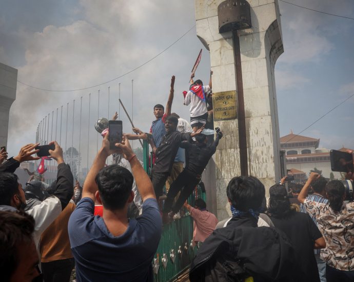 nepali-pm-forced-to-step-down,-parliament-torched-amid-deadly-protests