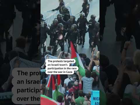 vuelta-cycle-race-ends-early-after-pro-palestinian-protests,-clashes-|-reuters