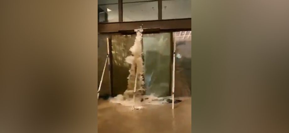 waves-burst-through-doors-of-hong-kong-hotel-during-typhoon-ragasa