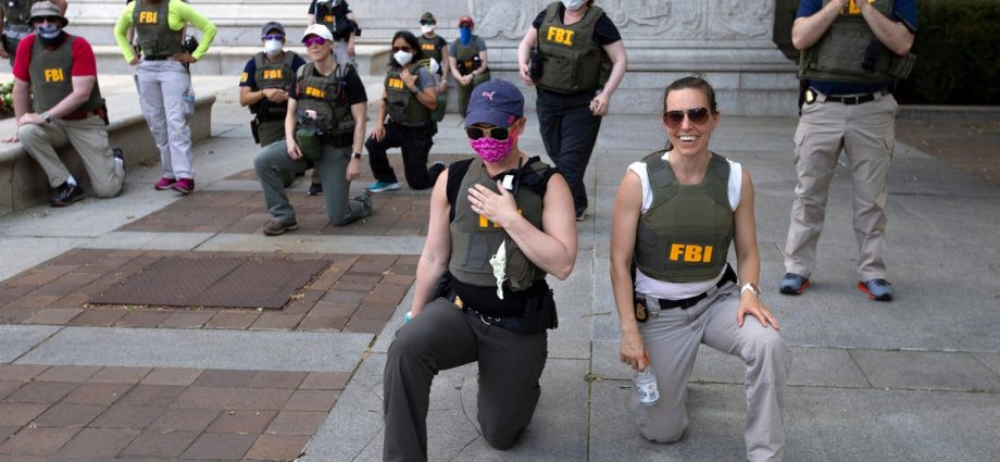 fbi-fires-agents-pictured-kneeling-during-2020-racial-justice-protest:-ap