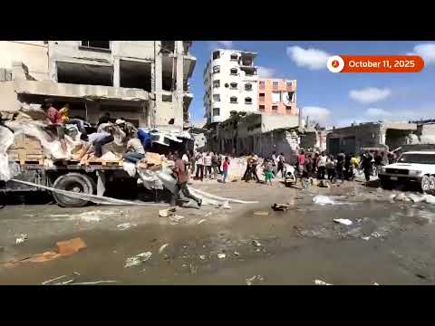 palestinians-crowd-around-aid-trucks-in-gaza’s-khan-younis-|-reuters