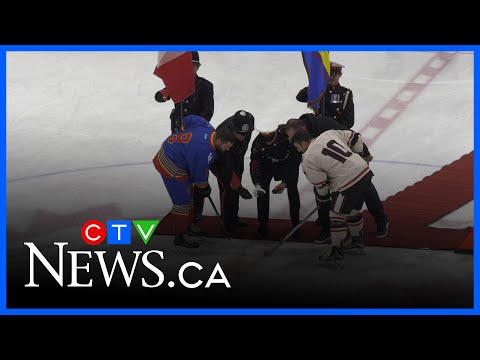 calgary-police,-fire-crews-face-off-in-charity-hockey-game
