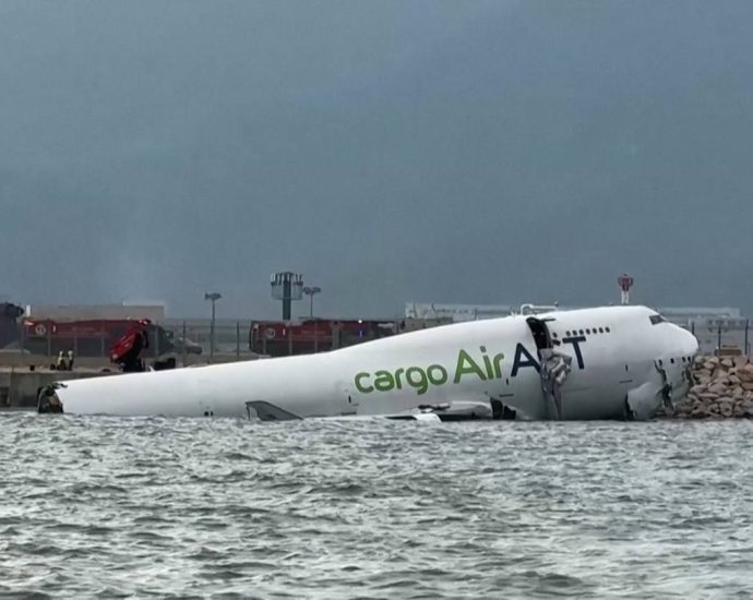 two-ground-staff-killed-at-hong-kong-airport-after-cargo-plane-skids-off-runway
