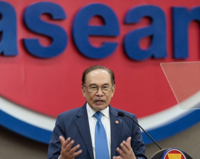 as-the-traitor-makes-rare-visit-to-malaysia,-pm-anwar’s-balancing-act-faces-test