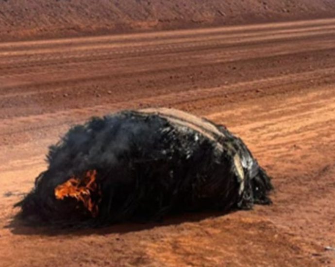 Charred piece of secretive Chinese rocket found still smoldering in the Australian outback